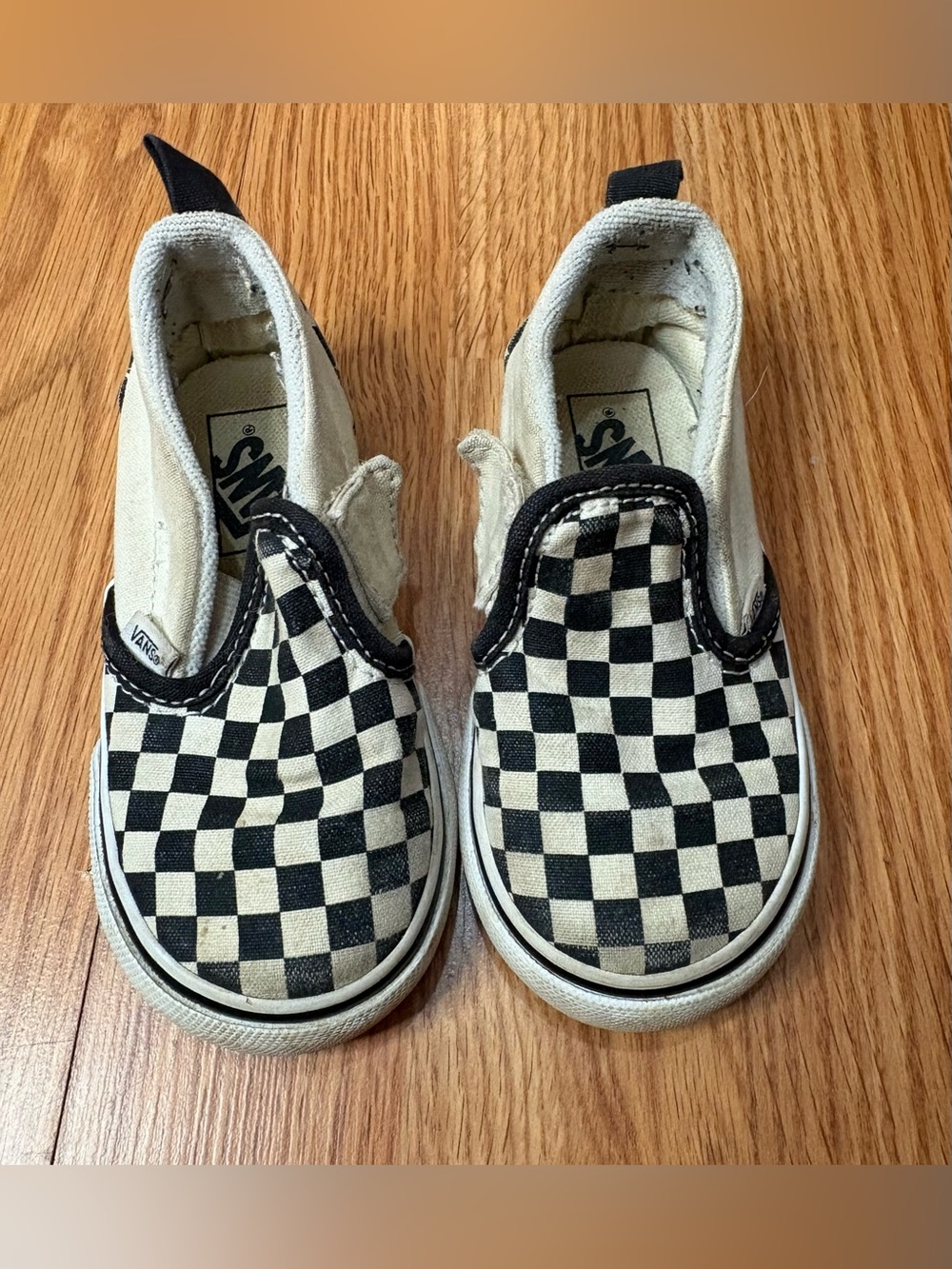 Vans Kids Checkerboard Slip-On Sneakers in Black and White